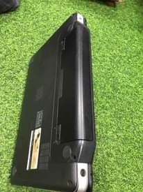 A picture of Dell vostro 1440core i3 imenyooka kila kitu lipia TSH 245