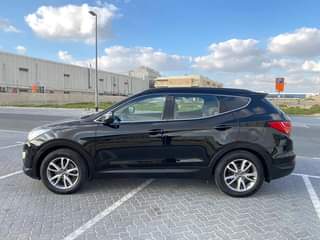 A picture of Hyundai santa Fe 2014 full option gcc specs watsapp 0551513562