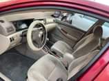 A picture of This is toks standard Toyota Corolla 2004 model just a