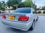 A picture of TOYOTA CARINA TI YEAR 2000 PRICE 8 8M CALL 0621007902