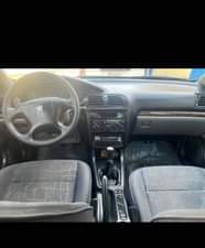 A picture of Distress sales Peageot 406 prestige 900k last owner additional 50k