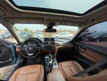 A picture of BMW 328i 2013 model Extremely clean Open sunroof Sound Engine