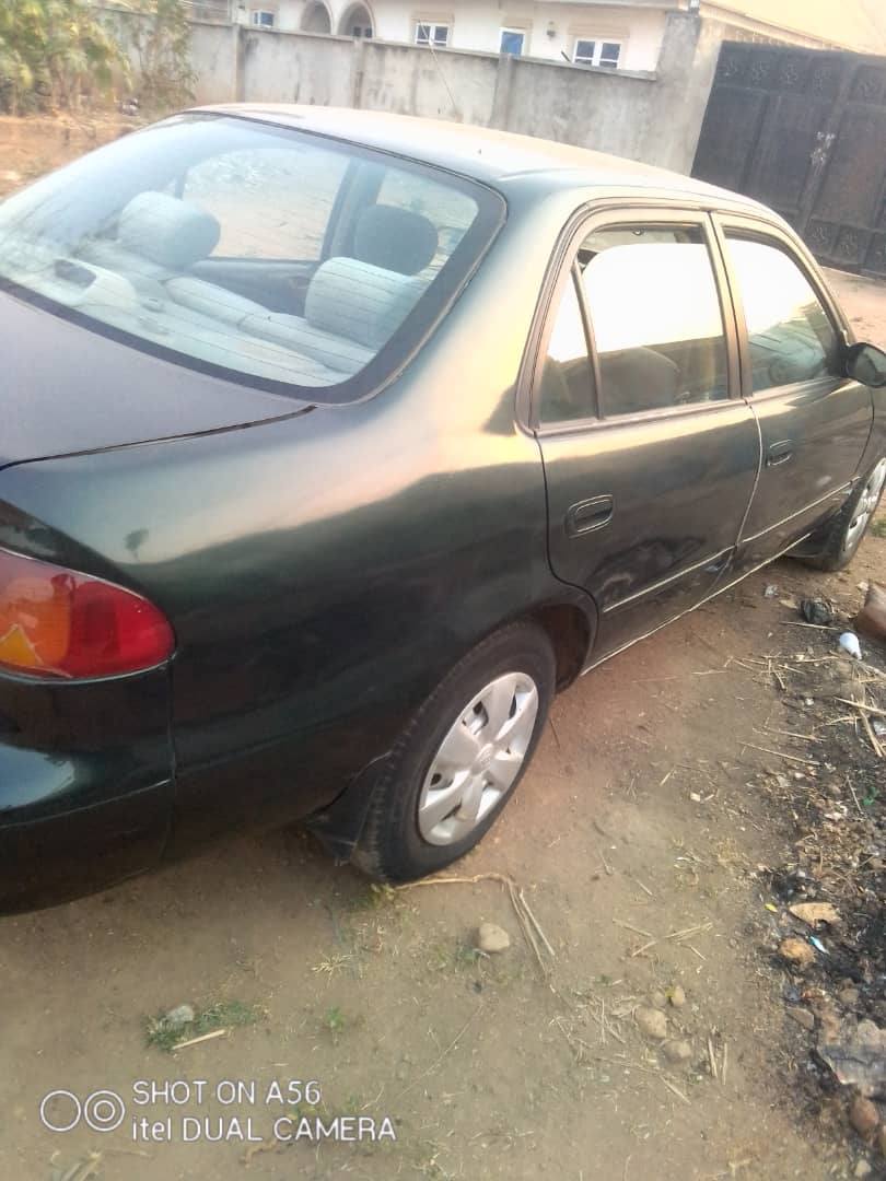 A picture of Toyota Corolla okerejuowo very neat and clean first body. Engine
