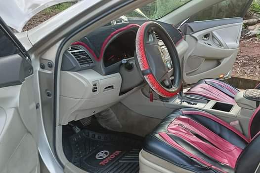 A picture of 2008 Toyota Camry painted Available 4sale or swap Deal Call