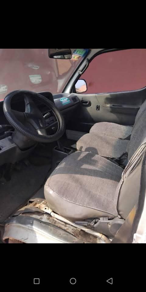 A picture of 2004 NIG USED TOYOTA HIACE BUS untampered good 4 plugs