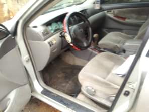 A picture of 2004 Corolla With sound engine ac chilling Gear selecting well