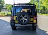 A picture of 2010 Jeep Wrangler Sport SUV 2D Mountain PKG.