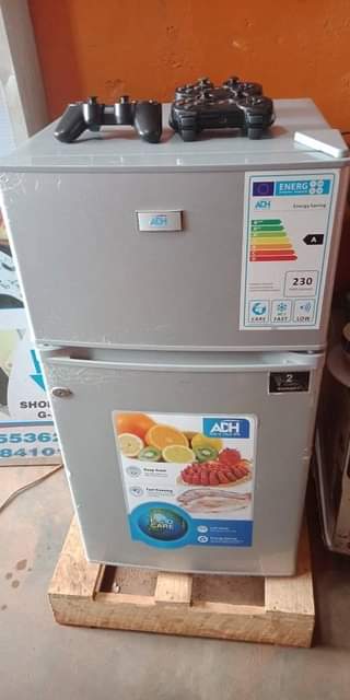 A picture of ADH fridge double door one months used everything thing is
