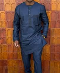 A picture of Fully Suit Available All sizes Check me Whatsapp 255 757556389