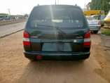 A picture of Clean Mazda 323 2004 model manual Tokunbo standard first body