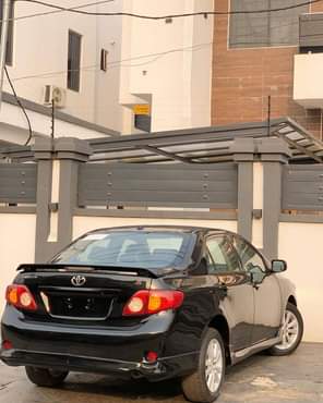 A picture of Brand TOYOTA Model Corolla Registered YEAR 2010 Color Black Price