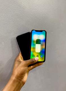 A picture of iphone XR body ya 14pro GB64 BH100