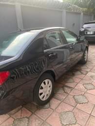 A picture of Toyota Corolla 2004 5 neatly flashed on first body everything
