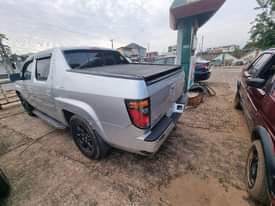 A picture of Forsale Honda ridgeline Sound engine Gearbox untouched Ac chilling massively