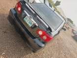 A picture of 2004 upgraded to 2006 corolla sport AC chilling Good tyres