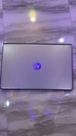 A picture of HP laptop Fridge and home theater