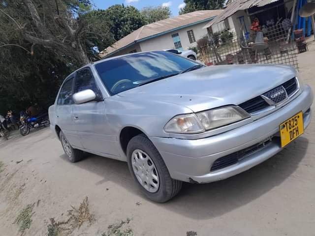 A picture of TOYOTA CARINA TI 5A 1490 CC BEI 7 7 MIL