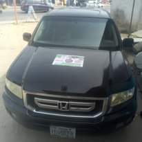 A picture of Honda Ridgeline 2011 Model Colour Black Condition No pin missing