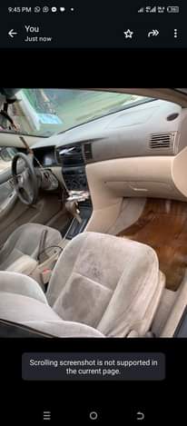 A picture of Toyota Corolla LE year 2004 engine and transmission and ac