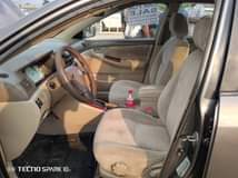 A picture of Highest grade Toyota Corolla everything is intact and untouched 03