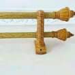 A picture of Curtain rods hooks and tiebacks