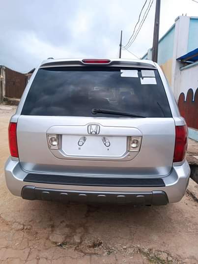 A picture of Toks standard registered 2005 Model Honda Pilot Super clean in