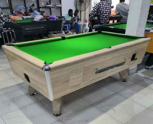 A picture of Snooker board with full accessories