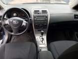 A picture of Toyota Corolla 2009 Engine is tapping at the top Ac