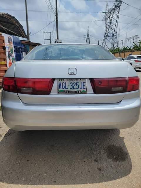 A picture of 2004 Honda Accord smoking engine