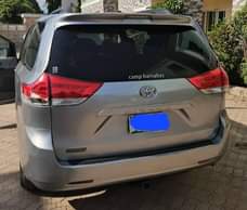 A picture of 2010 2011 Toyota Sienna Used by a woman in Abuja