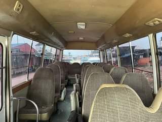 A picture of Neatly used Toyota coaster bus 2008 model flash on first