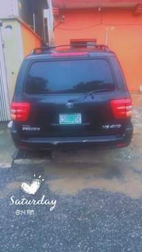 A picture of Perfectly working sequoia SUV 2006 black color. Leather seats with