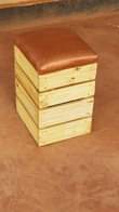A picture of Pallet ottoman with lather cushion