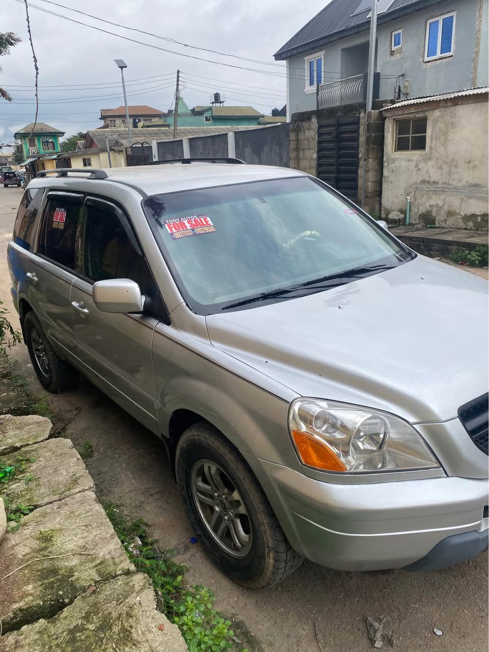 A picture of Honda Pilot tokunbo standard baked on firstbody pan location abule