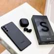 A picture of Used phones and brand new boxed phones
