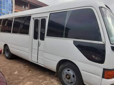 A picture of Toyota Coaster 4 sale Very clean Body and interior Sound