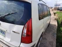 A picture of clean 3 seater Mazda premazy