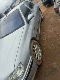 A picture of Peaguot 406 buy and drive E10 engine price 2 5M