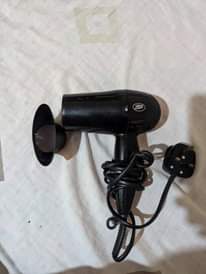 A picture of Hairdryer and hair straightener