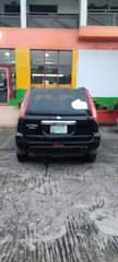 A picture of Nissan Xtrail 2011 model going for 2m settlement 100k Ac