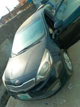 A picture of Kia tapping engine and transmission and ac is work okay
