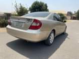 A picture of 2004 Camry with v6 Engine Leather interior Open roof Chilling
