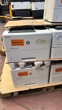 A picture of kyocera and hp mfp printers