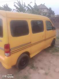 A picture of Suzuki mini bus. Enugu color on first body. Mini direct