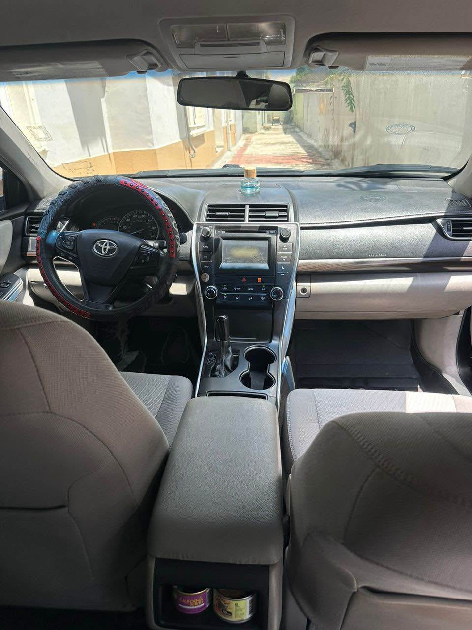 A picture of Toyota Camry 2015 model. No single fault. Price 10.5m .