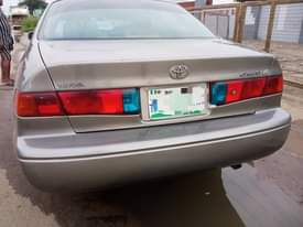 A picture of Tiny Big Light TOYOTA CAMRY OPEN ROOF With Extremely Sound