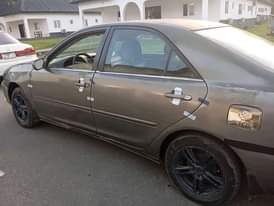 A picture of Toyota Camry big daddy is available 4 plugs Engine and
