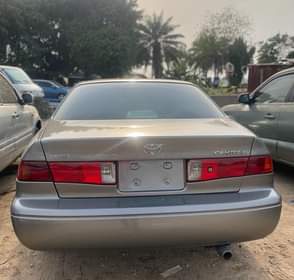 A picture of Very clean Toyota Camry big light with everything intact AC