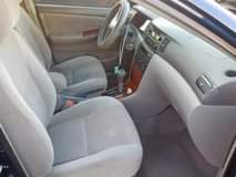 A picture of Toyota Corolla CE for sale 4 plugs Factory AC Good