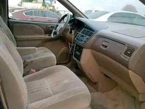 A picture of TOKUNBO 1999 TOYOTA SIENNA LE FORSALE THIS VEHICLE IS IN